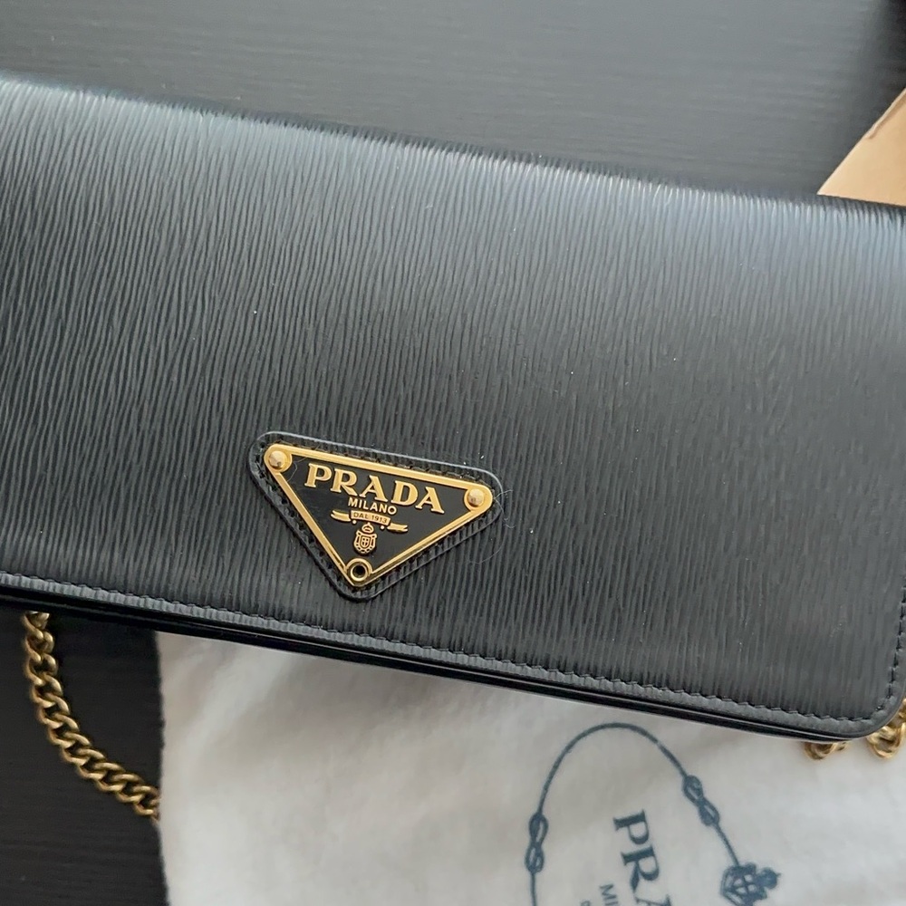 Prada chain on wallet